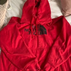 Red north face women’s sweatshirt
